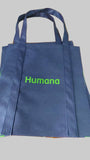 Navy blue non-woven polypropylene grocery bag with green 'Humana' logo on both sides.