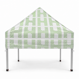 Patterned white side of Humana 5x5 ft canopy on white background
