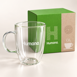 Close-up of the clear Humana double-wall glass mug and gift packaging