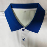 Actual Green/White Humana custom polo, close-up of navy collar and buttons