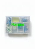 Transparent Humana office supply kit with notes, paper clips, tape and clips