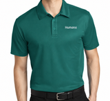 Port Authority polo teal para hombre con logo Humana blanco en pecho izquierdo
