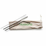 Set of metal straws with a carrying pouch on a white background, featuring the brand 'Humana'.